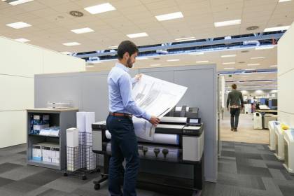 Man holding print completed by the HP Designjet T3500